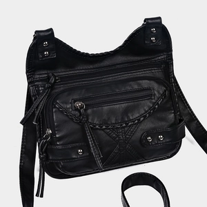 Retro black washed leather crossbody bag with multiple zippers and stud details