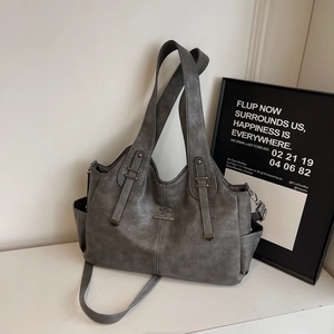 Vintage dark gray leather tote bag with dual handles and kangaroo logo decoration