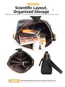 Detailed interior view of black crossbody bag showing multi-compartment storage layout