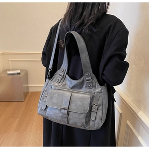 Retro grey leather tote bag with large capacity shown in a stylish interior lifestyle setting