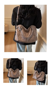Detail of soft PU leather tote bag with lychee texture and adjustable shoulder strap