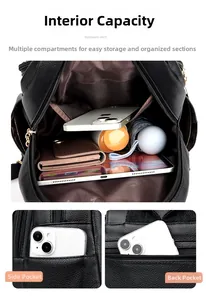 Detail view of large capacity main compartment and anti-theft back pocket on black leather backpack
