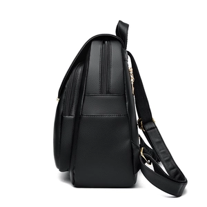 Black pebbled leather women backpack with gold zippers and multiple pockets