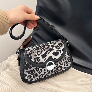 Retro leopard print shoulder bag with silver round buckle and black leather piping