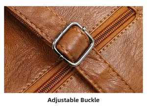Close-up of brown litchi grain leather texture and adjustable silver metal buckle detail