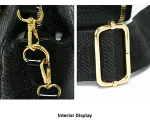 Close-up of golden metal hooks and black nylon strap on black crocodile texture handbag