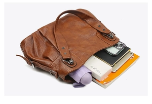 Large capacity brown PU leather tote bag showing spacious interior with daily essentials