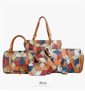 Detailed macro view of a 6-piece tote bag set with blue geometric pattern and brown handles