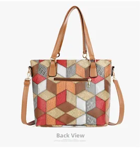 Rear view of the geometric multi-color tote bag featuring a functional zipper pocket