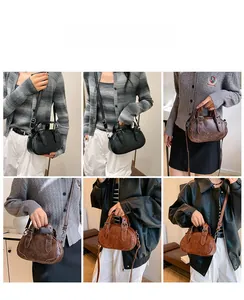 Detailed views of vintage bowling bag with studs shown in hand, shoulder, and crossbody styles