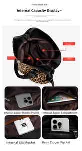 Detailed view of the leopard print tote bag interior with multiple zippered compartments
