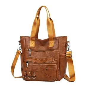Brown vintage multi-pocket tote bag with yellow straps on a clean white background