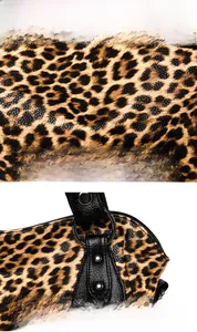 Detail view of leopard print tote bag showing reinforced stitching and metal rings