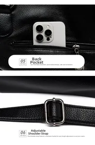 Detail of black lychee leather tote with rear zipper pocket and adjustable strap buckle