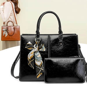 Black oil wax leather tote bag set with decorative silk scarf and matching inner pouch