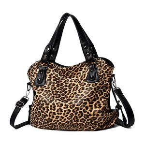 Large capacity leopard print tote bag with black handles and adjustable shoulder strap