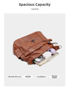 Detailed internal view showing large capacity for phone, wallet and cosmetics in brown bag
