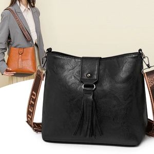 Sac seau rétro avec détail de pompon et bandoulière guitare en jacquard pour femme