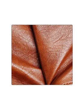 Macro view of brown lychee texture leather showing soft and thick material detail