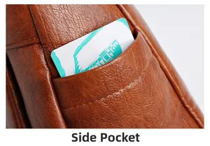 Detail view of the side pocket on brown leather crossbody bag with card inserted