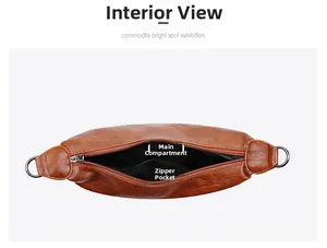 Detailed interior of brown pebbled leather crossbody bag with main compartment and zip pocket