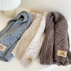 Thick knit scarves in blue, beige, and brown with hollow diamond patterns for autumn