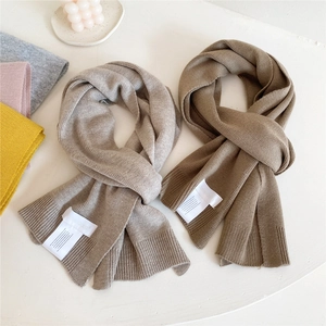 Chic long knit scarf for winter in oatmeal and dark coffee tones with ribbed edges