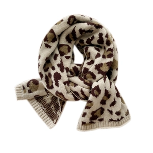 Winter leopard print knit scarf in cream with brown patterns and ribbed edges