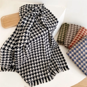 Classic houndstooth knit scarf with fringes in multiple colors for winter warmth