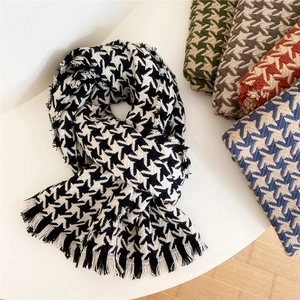 Classic houndstooth knit scarf for women featuring fringe edges in multiple colors
