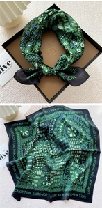 Detail of silk square scarf with vintage geometric prints in a luxury gift box