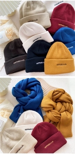 Detailed close-up of knitted winter scarf set with exquisite normalcrush embroidery