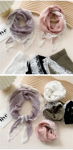 Detailed close-up of lace embroidery and pom-pom trim on soft cotton linen triangle scarves