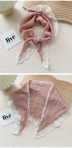 Pink lace cotton linen triangle scarf with white crochet trim and mini tassels in detail
