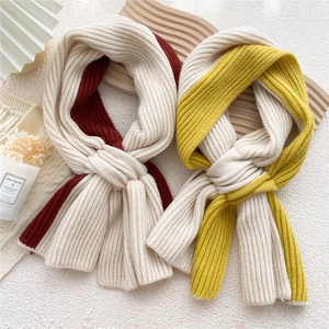 Knitted two-tone ribbed scarf with cross-knot design for autumn and winter warmth