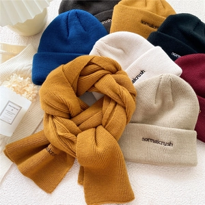 Chic knit hat and scarf set with letter embroidery in various vibrant winter colors