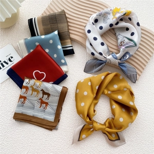 Mulberry silk scarf collection with various patterns like polka dots and illustrations