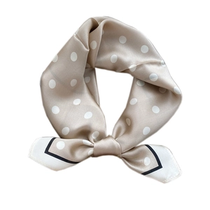 Champagne silk neckerchief with white polka dots and black and white border detail