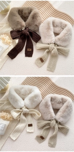 Detail of faux rabbit fur collar with cable knit ties and branded leather tags