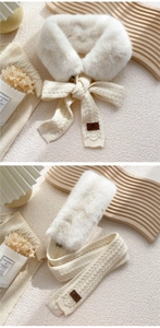Close-up of beige faux fur scarf with cable knit pattern and brown leather brand label