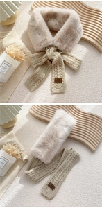 Close-up of faux rabbit fur scarf with cable knit texture and leather logo detail
