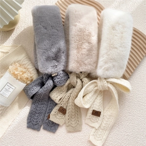 Chic faux rabbit fur neck warmer with cable knit bow and stylish leather patch detail