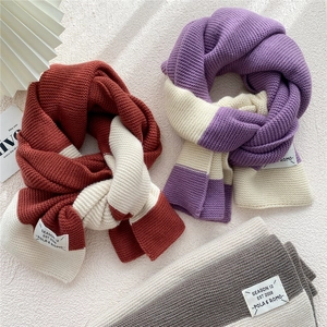 Thick two-tone striped knitted scarf in orange, purple, and gray with SEASON 12 tags