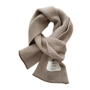 Classic earth brown herringbone knit scarf with white woven patch for winter warmth