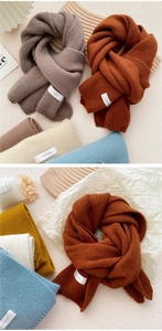 Close-up of soft thick knitted scarves in multi-color options with ribbed edge detail