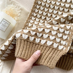 Brown and white knit scarf with heart patterns featuring ribbed cuff details for winter