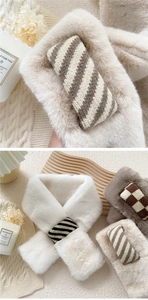 Detail of plush faux fur scarf showing soft texture and stylish knitted loop fastener