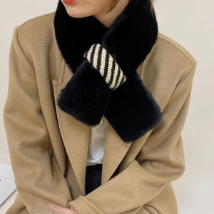 Winter faux rabbit fur cross scarf in black with striped loop on a camel coat