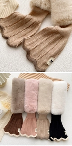 Detail of ribbed knit and faux fur crossover scarves in four elegant winter colors