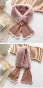 Close-up of pink faux fur plush scarf with ribbed knit detail and decorative wavy edges